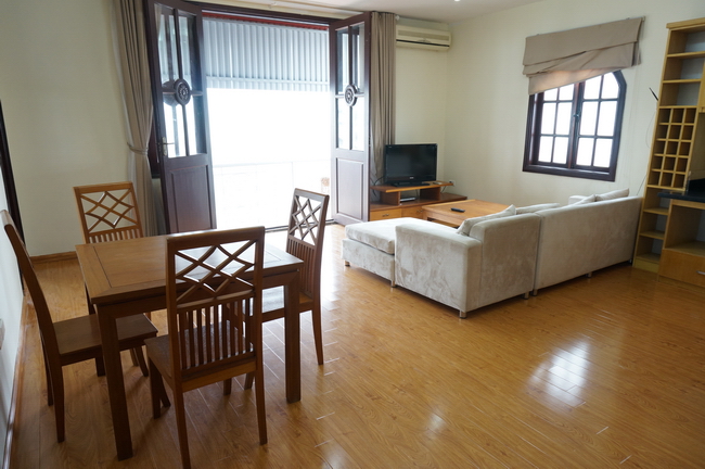 A bright serviced apartment on Xuan Dieu street, big balcony, fully furnished, hardwood flooring, security 24/7