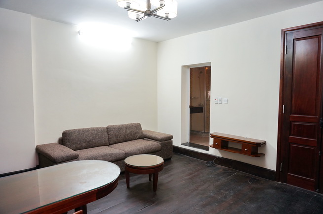 Classic duplex apartment for rent on Hang Than street, Hoan Kiem district, full furniture, balcony, hardwood flooring