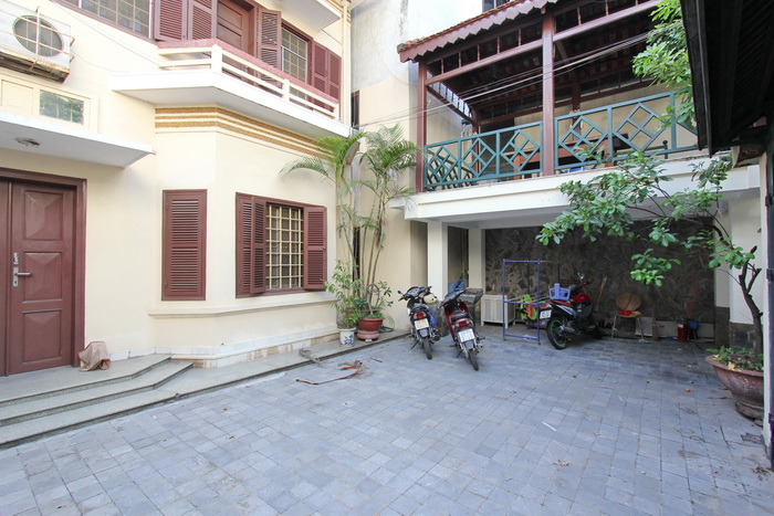 Unique charm house for rent in Ba Dinh District having a big front of yard